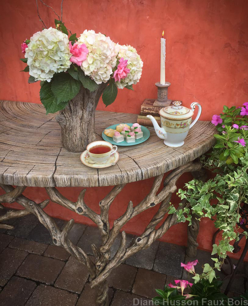 large demilune faux bois console table with tea service
