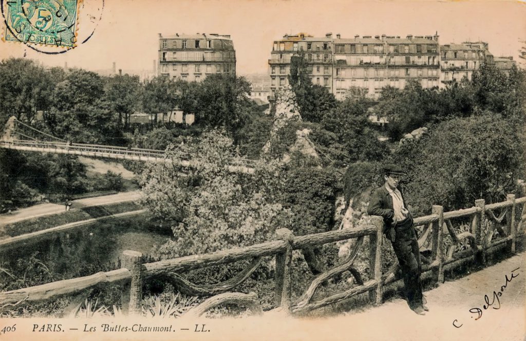 vintage photo of a man at Les Buttes-Chaumont with a faux bois railing