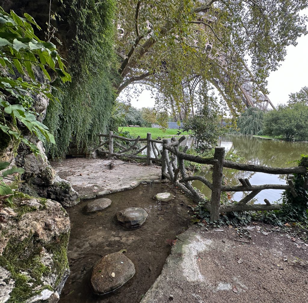 Old faux bois fences near base of Eiffel Tower